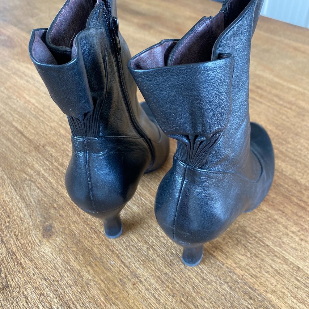 Biviel (from The Bay) Zip up black heeled boot.